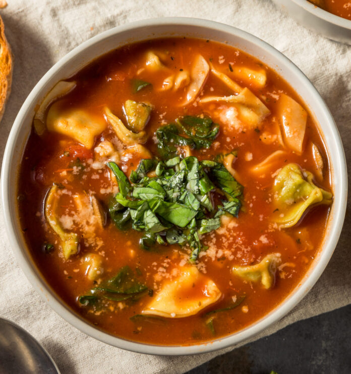 Homemade Italian Tortellini Soup with Cheese and Basil